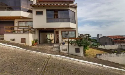 Casa em condomínio fechado com 3 quartos à venda na Rua Alcebíades Antônio dos Santos, 635, Nonoai, Porto Alegre