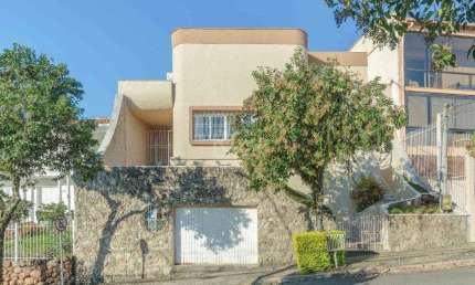 Casa com 4 quartos à venda na Rua Fernando Osório, 440, Teresópolis, Porto Alegre