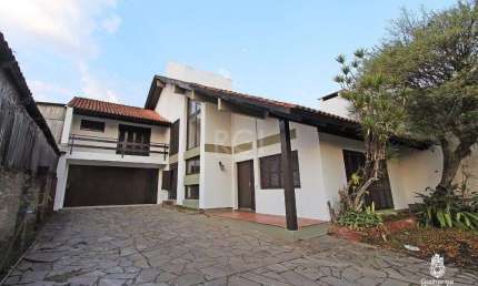 Casa para Venda - 320m², 4 dormitórios, sendo 1 suites, 3 vagas - Cavalhada