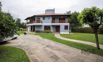 Sobrado com 6 suites, lareira, lavabo, pátio - Bairro Belém Velho