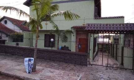 Prédio residencial de 338m² com 4 apartamentos independentes no bairro Santa Ter