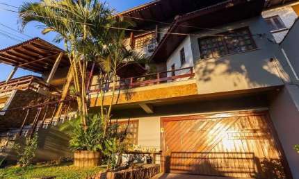 Casa espaçosa com 6 dormitórios e vista incrível no Cristo Redentor
