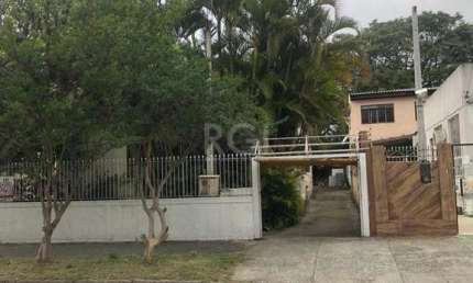 Casa/terreno medindo 200m² de privativo, 550m² totais  no bairro Partenon, 9 vag