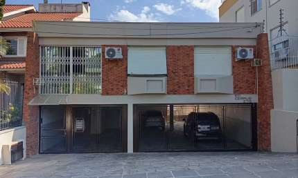Apartamento térreo com 3 dormitórios e 2 vagas no Bairro Cristo Redentor