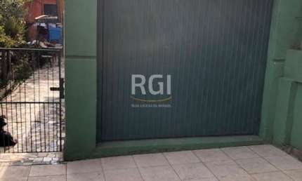 Terreno à venda na Rua Xavier da Cunha, 677, Nonoai, Porto Alegre