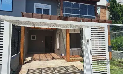 Casa com 3 quartos à venda na Rua Aldo Sani, 84, Hípica, Porto Alegre
