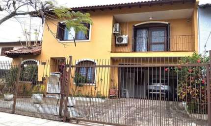Casa 5 dormitórios à venda Campo Novo Porto Alegre/RS