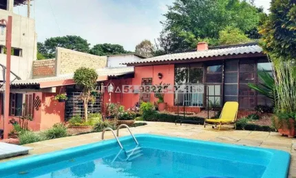 Casa com 6 quartos à venda na Avenida Arnaldo Bohrer, 171, Teresópolis, Porto Alegre
