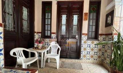 Casa com 4 dormitórios à venda, 300 m² por R$ 2.000.000,00 - Macuco - Santos/SP