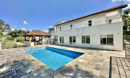 Casa Luxuosa com 5 Dormitórios (4 Suítes), Piscina Aquecida e Espaço Gourmet Completo