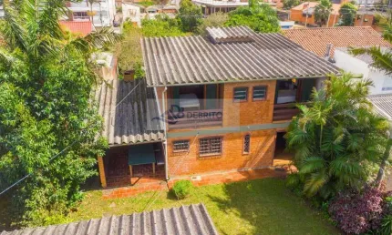 Casa para Venda em Tramandaí, Centro, 7 dormitórios, 5 banheiros, 2 vagas