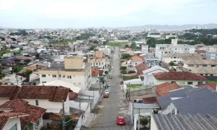 Sobrado com 2 dormitórios com possibilidade de 1 terceiro quarto a venda, 140 m² por R$ 400.000 - Ipiranga - São José/SC