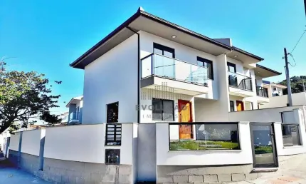 Casa com 3 dormitórios à venda, 107 m² por R$ 659.000,00 - Potecas - São José/SC