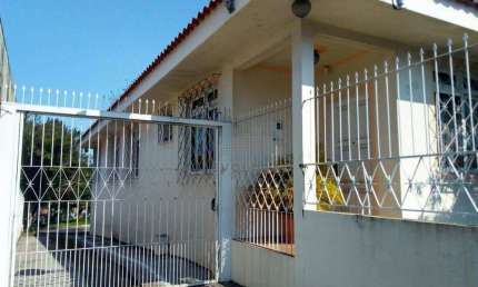 Casa com 4 dormitórios à venda, 216 m² por R$ 955.000,00 - Ipiranga - São José/SC