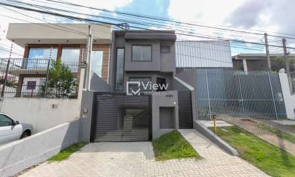 Casa com 3 quartos à venda na Rua dos Alfeneiros, 1083, Boa Vista, Curitiba por R$ 699.000