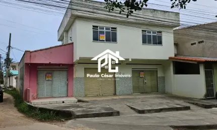 Prédio composto por: 03 Lojas com Banheiros e um Apartamento composto por, 02 Quartos, 02 Banheiros, copa, cozinha, sala, área de serviço, garagem e u