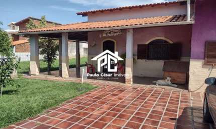Casa com 02 Quartos sala cozinha banheiro área de serviço varandas garagem anexo varandas com churrasqueira 01 banheiro e 01 quarto. Mais terreno anex