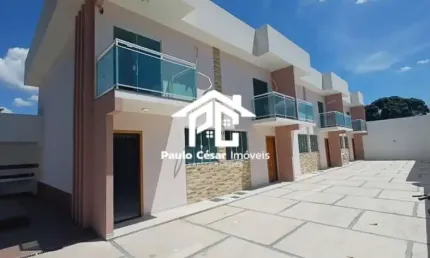 Casa em Vila à Venda em Araruama-RJ: 2 quartos, 2 suítes, 2 salas, 1 banheiro, 90m² na Praça da Bandeira