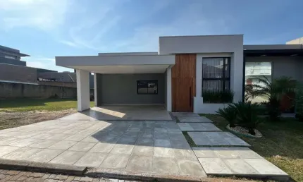 Casa com 3 dormitórios à venda, 134 m² por R$ 825.000,00 - Reserva do Arvoredo - Gravataí/RS