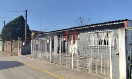 Casa com 3 dormitórios à venda, 150 m² por R$ 400.000 - Cruzeiro - Gravataí/RS