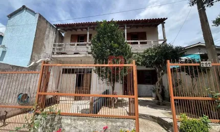 Sobrado com 4 dormitórios à venda, 200 m² por R$ 372.000,00 - Auxiliadora - Gravataí/RS