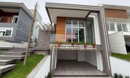 Casa com 3 dormitórios à venda, 220 m² por R$ 2.190.000,00 - Alphaville - Gravataí/RS