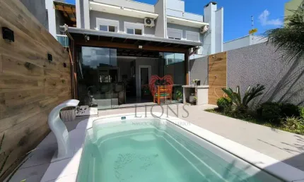 Sobrado com 3 dormitórios à venda, 133 m² por R$ 799.000,00 - Renascença - Gravataí/RS