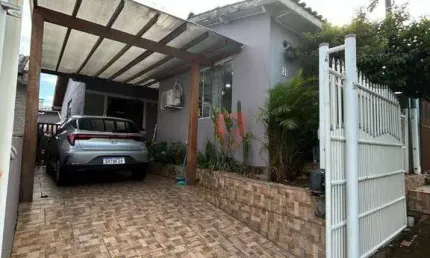 Casa com 2 dormitórios à venda, 100 m² por R$ 383.000 - Ibiza - Gravataí/RS