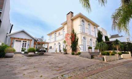 Sobrado com 4 dormitórios à venda, 231 m² por R$ 1.500.000,00 - Dom Feliciano - Gravataí/RS