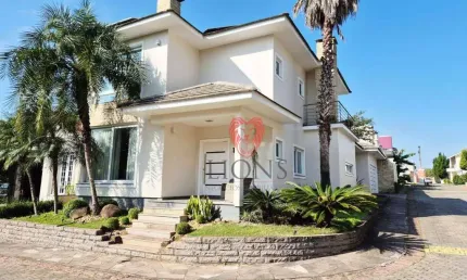 Sobrado com 3 dormitórios para alugar, 239 m² por R$ 10.780/mês - Dom Feliciano - Gravataí/RS