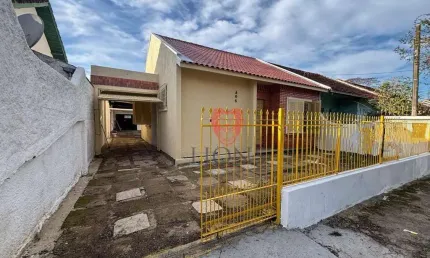 Casa com 3 dormitórios, 85 m² - venda por R$ 478.800 ou aluguel por R$ 2.034/mês - Caça e Pesca - Gravataí/RS