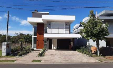 Sobrado com 3 dormitórios à venda, 215 m² por R$ 2.490.000,00 - Alphaville - Gravataí/RS