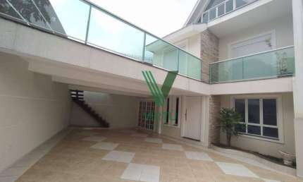 Sobrado com 3 dormitórios para alugar, 320 m² por R$ 5.170,00/mês - Portão - Curitiba/PR