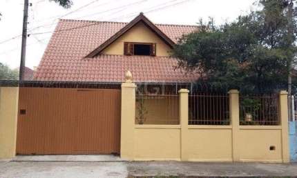 Casa com 3 quartos à venda na Rua Afonso Rodrigues, 340, Jardim Botânico, Porto Alegre