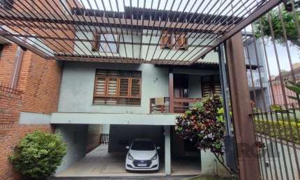 Casa com 4 quartos à venda na Avenida Arnaldo Bohrer, 182, Teresópolis, Porto Alegre