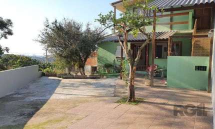 Casa com 3 quartos à venda na Acesso das Palmeiras, 329, Santa Tereza, Porto Alegre