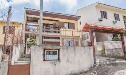Casa com 4 quartos à venda na Rua Santiago Dantas, 508, Cascata, Porto Alegre