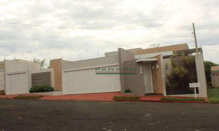 Casa com 3 dormitórios à venda, 274 m² por R$ 1.400.000,00 - Jardim das Acácias - Cravinhos/SP