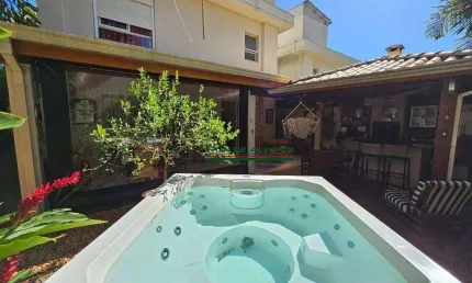 Casa com 3 dormitórios à venda, 275 m² por R$ 1.480.000,00 - Guaporé - Ribeirão Preto/SP