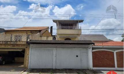 Sobrado comercial a venda na Vila Ré, com um salão contendo banheiro e pia, lavanderia, 2 vagas de garagem, 2 dormitórios sendo 1 suíte