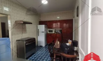 Apartamento a venda de 94 m² na Vila Carrão, 2 dormitórios, 1 banheiro, lavanderia, área de serviço, cozinha, sala, garagem coberta, quintal, dispensa