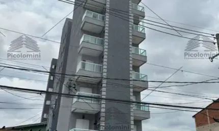 Apartamento à venda com 2 quartos e 1 suíte em Santo André-SP: 56m², sala, 2 banheiros e 1 vaga de garagem.