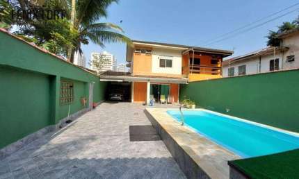 Sobrado com 4 dormitórios à venda, 106 m² por R$ 1.200.000,00 - Canto do Forte - Praia Grande/SP