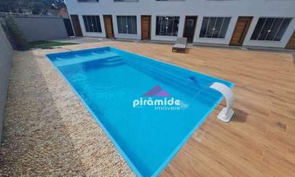 Casa com 2 dormitórios à venda, 72 m² por R$ 480.000,00 - Massaguaçu - Caraguatatuba/SP