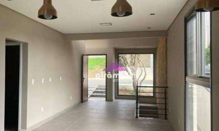 Casa com  3 dormitórios, sendo 1 suíte à venda, 220m², por R$ 1.250.000,00 - Condomínio Fechado - Caçapava/SP