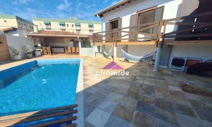 Casa com 3 dormitórios à venda, 340 m² por R$ 2.700.000,00 - Indaiá - Caraguatatuba/SP