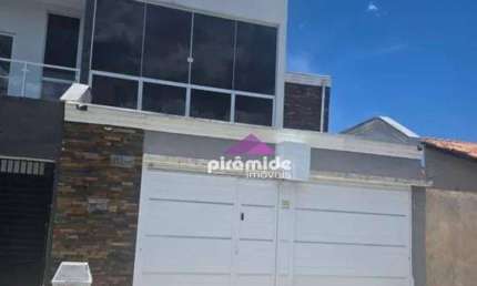 Casa com 2 dormitórios à venda, 104 m² por R$ 590.000,00 - Balneário dos Golfinhos - Caraguatatuba/SP