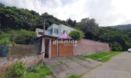 Casa com 3 dormitórios à venda, 250 m² por R$ 750.000,00 - Barequeçaba - São Sebastião/SP
