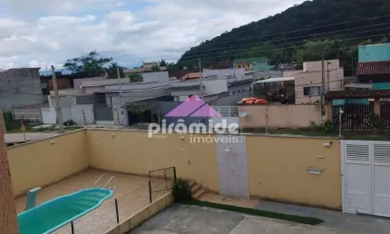 Casa com 2 dormitórios à venda, 75 m² por R$ 420.000,00 - Massaguaçu - Caraguatatuba/SP
