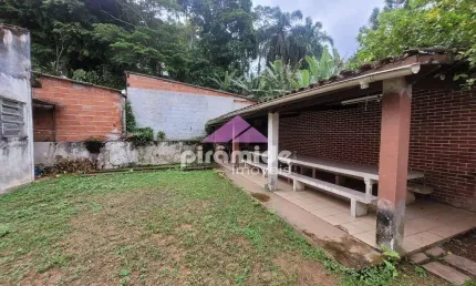 Casa com 3 dormitórios à venda, 214 m² por R$ 590.000,00 - Massaguaçu - Caraguatatuba/SP